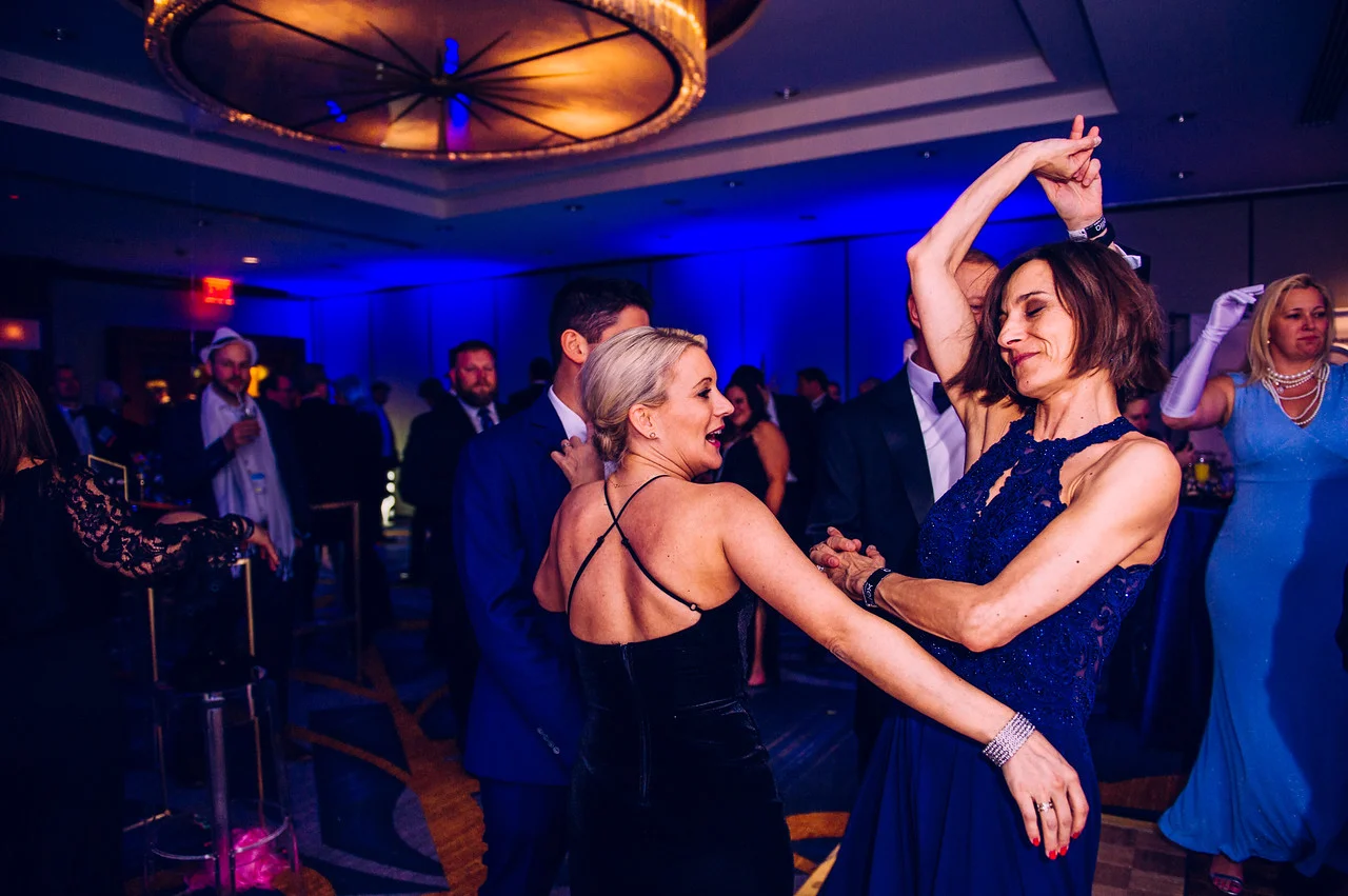 Guests dancing at an All Generations corporate event.