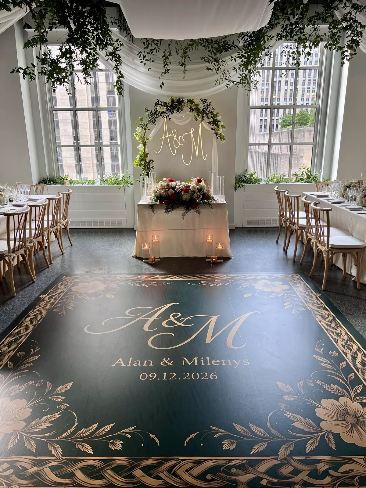 Alan and Milenys’ real custom green-and-gold wedding dance floor in the finished reception room.