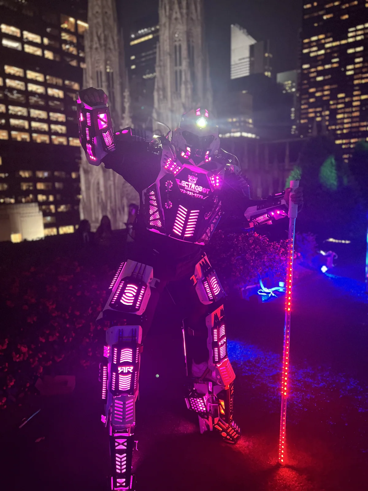 A real LED robot performer bringing energy to an evening event.